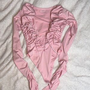 Elegant Pink Ruffled Bodysuit